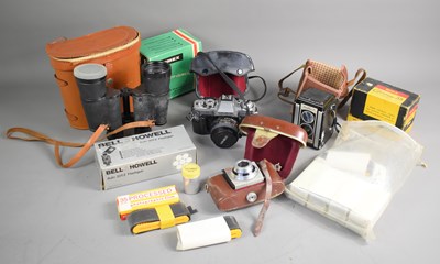 Lot 340 - A group of vintage cameras and accessories to...
