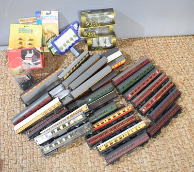 Lot 310 - A large group of Lima OO gauge railway coaches...