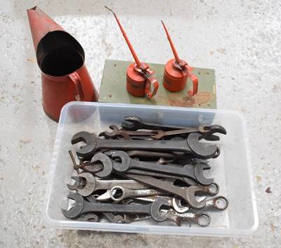 Lot 316 - Three vintage oil cans together with a Veteran...