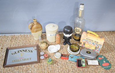 Lot 200 - A group of collectables to include a Disney...