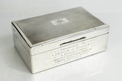 Lot 1 - A silver cigarette box, presentation engraved,...