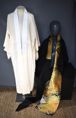 Lot 23 - Two silk Kimonos, one in cream, the other half...