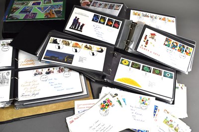 Lot 178 - A collection of First Day Covers, loose and in...