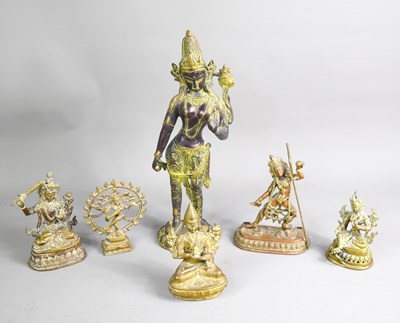 Lot 24 - A group of brass and bronze Tibetan figures to...
