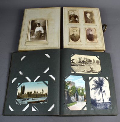 Lot 133 - A part album of Edwardian and later postcards...