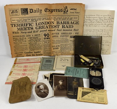 Lot 207 - A group of collectables to include a WWII...