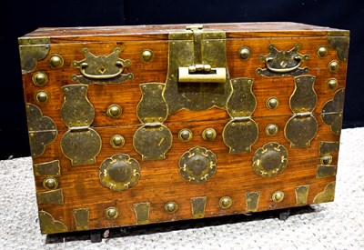 Lot 38 - A Korean elm and brass mounted bandaji chest,...