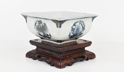 Lot 7 - A Qing Dynasty Chinese blue and white square...