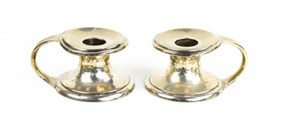 Lot 310 - A pair of Scottish silver chamber sticks,...
