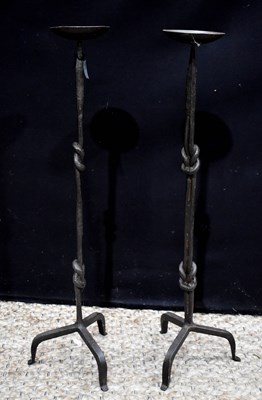 Lot 350 - A pair of antique style wrought iron pricket...