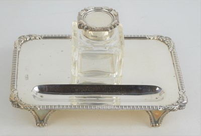 Lot 28 - An early 20th century silver pen tray with...