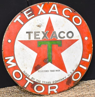 Lot 65 - Enamel Signs: A vintage 'Texaco Motor Oil'...