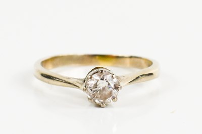 Lot 224 - An 18ct gold and diamond solitaire ring, the...