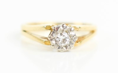 Lot 48 - An 18ct gold and diamond solitaire ring, the...