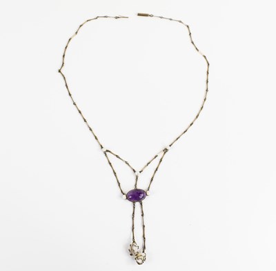 Lot 32 - A white metal, pearl and amethyst Art Nouveau...