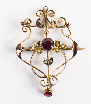 Lot 124 - An Edwardian gold pendant / brooch, set with...