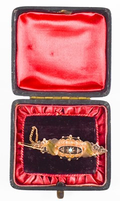 Lot 151 - A 9ct gold mourning bar brooch, set with a...