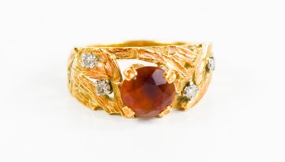 Lot 130 - An 18ct gold, diamond and citrine ring,...