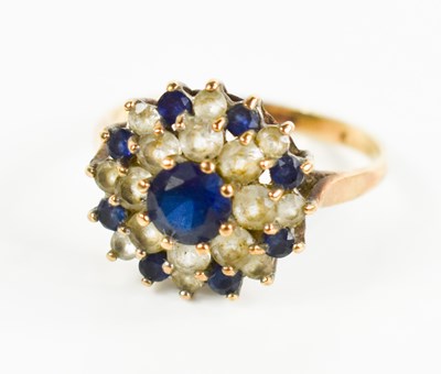 Lot 177 - A 9ct gold, sapphire and paste cluster ring,...
