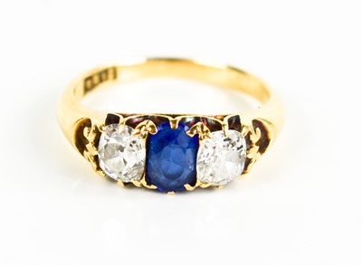 Lot 42 - An 18ct gold, diamond and sapphire ring, the...