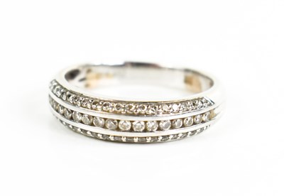 Lot 119 - A 9ct white gold, and diamond cluster ring,...