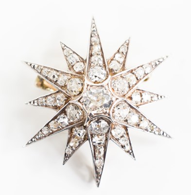 Lot 21 - An impressive gold and diamond starburst...