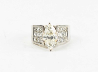 Lot 100 - An 18ct white gold and diamond ring, the...