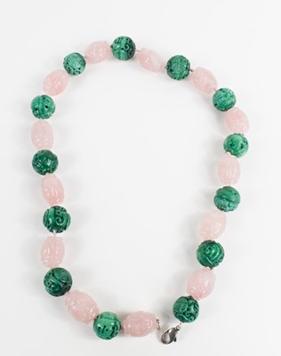 Lot 166 - A Chinese rose quartz and malachite beaded...
