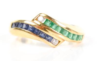 Lot 213 - A gold, diamond, sapphire and emerald ring,...