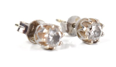 Lot 231 - A pair of 18ct gold stud earrings, the...