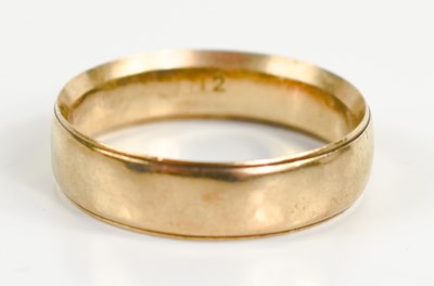 Lot 225 - A 9ct gold wedding band, size Q, 3.52g.