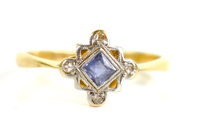 Lot 260 - An 18ct gold and sapphire ring, the princess...