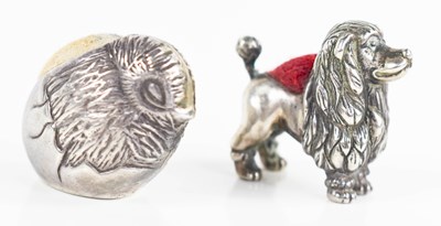 Lot 163 - Two silver Victorian pin cushions, one in the...