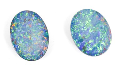 Lot 222 - A pair of black opal doublets, loose, 1.9 by 1....