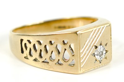 Lot 125 - A 9ct gold and diamond gentlemans ring, the...