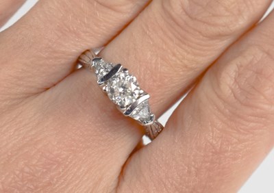 Lot 203 - A platinum and diamond ring, the central Old...