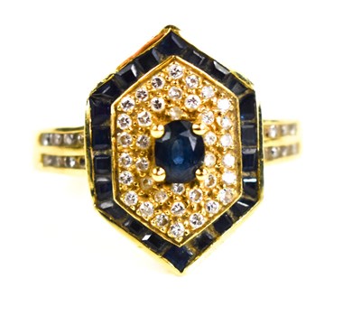 Lot 15 - An 18ct gold, green/blue sapphire and diamond...