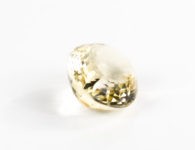 Lot 338 - A large oval citrine, facet cut, 2cm long, 4.5g.