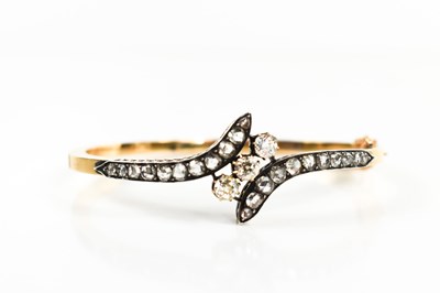 Lot 109 - An impressive gold and diamond bracelet, the...