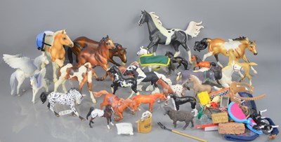 Lot 90 - A group of Breyer Reeves, Bully and Schleich...