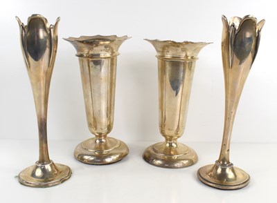 Lot 345 - A pair of Art Nouveau silver vases of tulip...