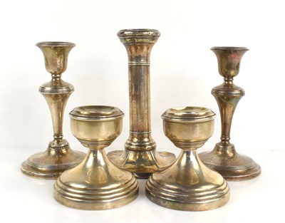 Lot 342 - A group of silver candlesticks to include a...