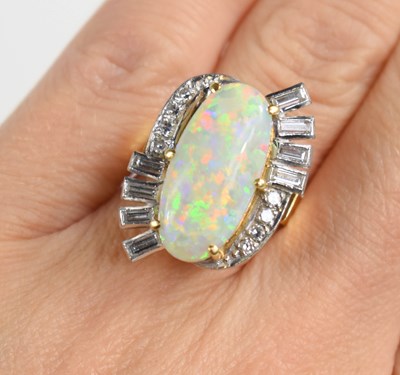 Lot 28 - A 1970s 18ct gold, opal and diamond ring, the...