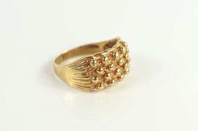 Lot 83 - A 9ct gold keeper ring, with woven design,...