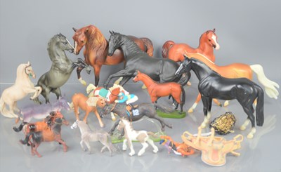 Lot 84 - A collection of model horses to include Breyer...