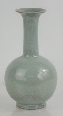 Lot 311 - A Chinese celadon glaze bottle vase, 23cm high