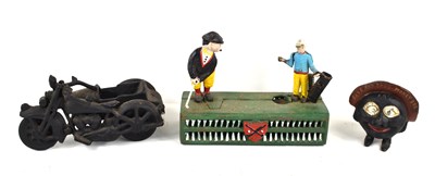 Lot 306 - A vintage cast iron 'Birdie Putt' style money...