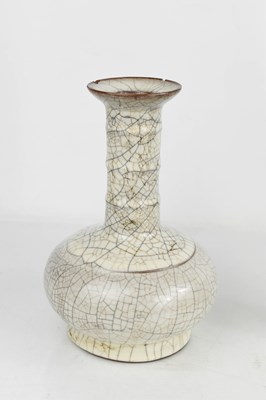 Lot 313 - A Chinese cream crackle glaze bottle vase,...