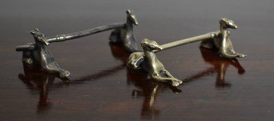 Lot 114 - A pair of silver plated knife rests in the...