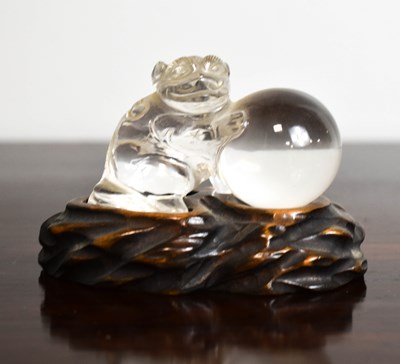 Lot 140 - A Chinese rock crystal carving depicting an...